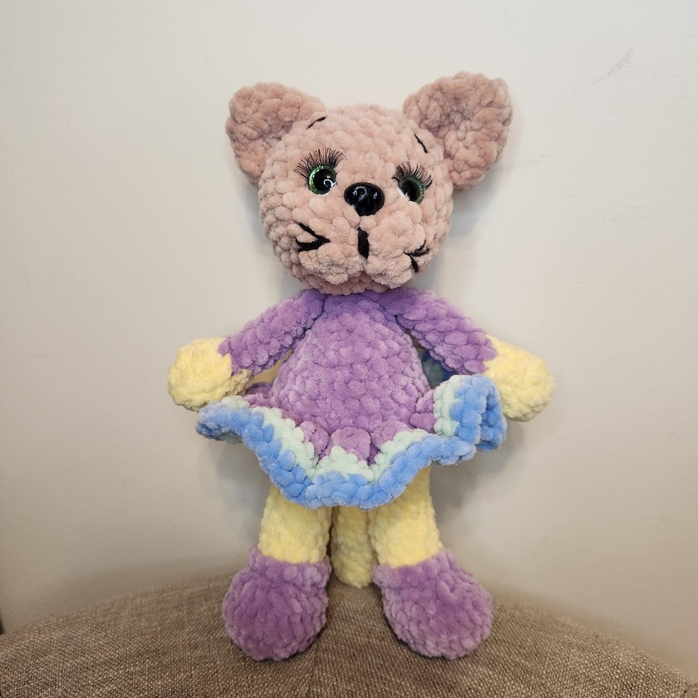 Plush Toy with Purple and Yellow Outfit